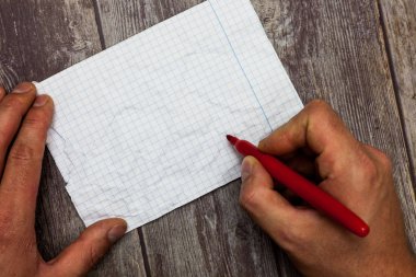 İş kavramı boş kopya alanı modern arka plan Huanalysis el Holding Marker kalem yazma boş grafik kağıdı ahşap yüzey üzerinde tasarım