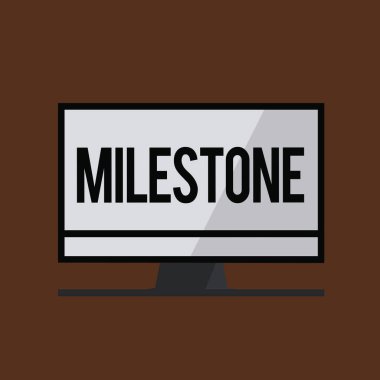 Kavramsal el kilometre taşı gösterilen yazma. Önemli aşama ya da bir şey, gelişmesinde olay vitrine iş fotoğraf