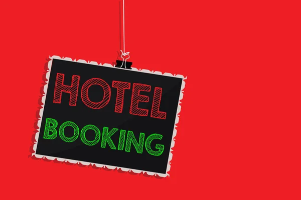 Handwriting text writing Hotel Booking. Concept meaning Online Reservations Presidential Suite De Luxe Hospitality Hanging blackboard message communication information sign red background. — Stock Photo, Image