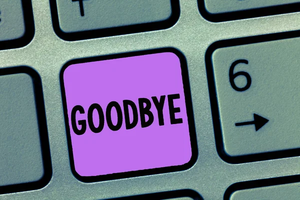 Konceptuella hand skriva visar Goodbye. Företag foto skylta hälsning för lämnar farväl se du snart Separation salute — Stockfoto