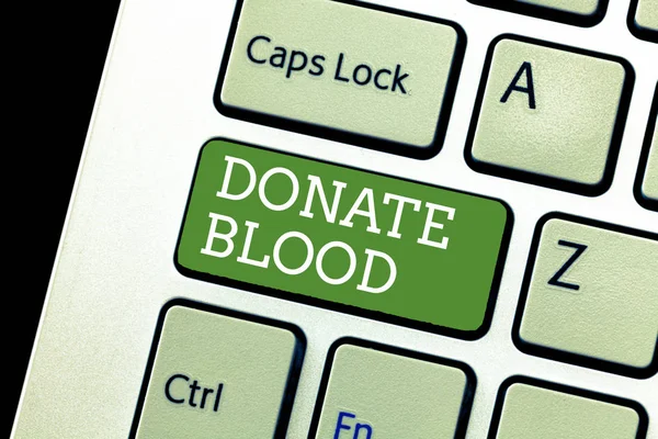 Escribir texto a mano Donar Sangre. Concepto significado Se refiere a la recolección de sangre comúnmente de donantes — Foto de Stock