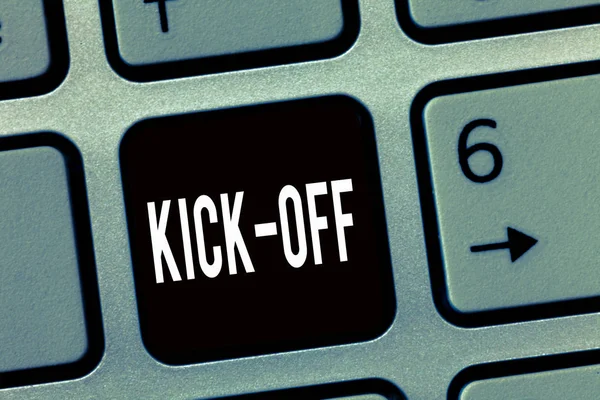 Text sign showing Kick Off. Conceptual photo start or resumption of football match in which player kicks ball