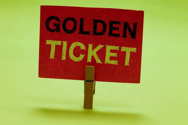 Text sign showing Golden Ticket. Conceptual photo Rain Check Access VIP Passport Box Office Seat Event Clothespin holding red paper important communicating messages ideas.