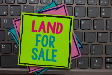 Handwriting text writing Land For Sale. Concept meaning Real Estate Lot Selling Developers Realtors Investment Papers reminders keyboard Inspiration communicate Annotations Type computer. clipart