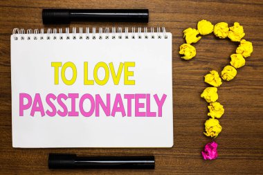 Kavramsal el için aşk tutkuyla gösterilen yazma. Güçlü biri ya da bir şey başka sevgi beyaz sayfa parlak renk kelime siyah kalem sarı kağıt lob ile duygu vitrine iş fotoğraf.