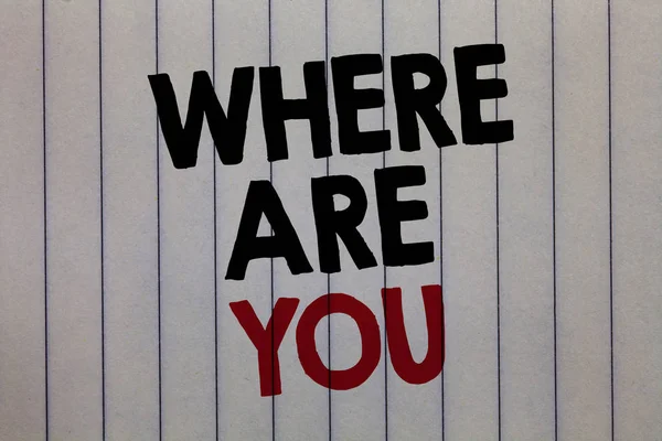 Handwriting text writing Where Are You. Concept meaning Give us your location address direction point of reference white vertical paper written three words with black and red color.