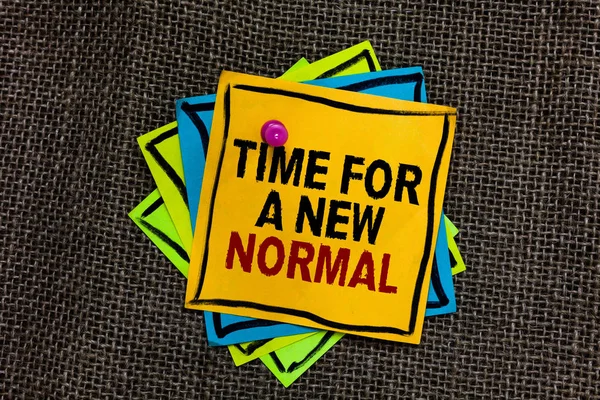 Text sign showing Time For A New Normal. Conceptual photo Make a big dramatic change Replace the expected Black bordered different color sticky note stick together with pin on jute sack. — Stock Photo, Image