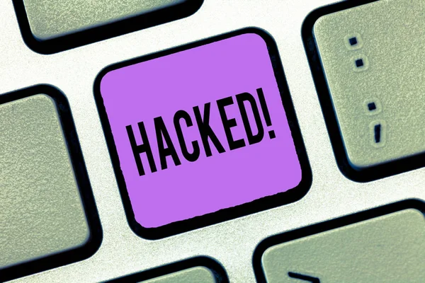 Writing note showing Hacked. Business photo showcasing Gain unauthorized access to data in system or computer Cyber crime — Stock Photo, Image