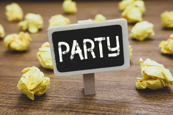 Writing note showing Party. Business photo showcasing social gathering invited guests involve eating drinking entertainment Blackboard crumpled papers several tries not satisfied wooden floor. — Stock Photo, Image