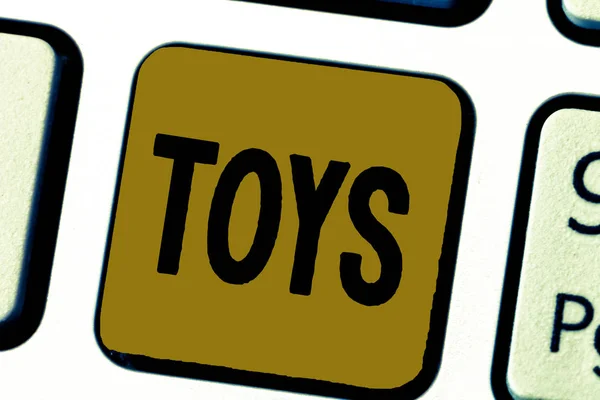 Ord skriva text leksaker. Affärsidé för ett objekt för ett barn att leka med som tillhandahåller nöjen för vuxen — Stockfoto