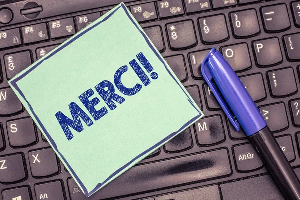 Writing Obs visar Merci. Företag foto skylta definieras som tack i franska språket att vara tacksam att någon — Stockfoto