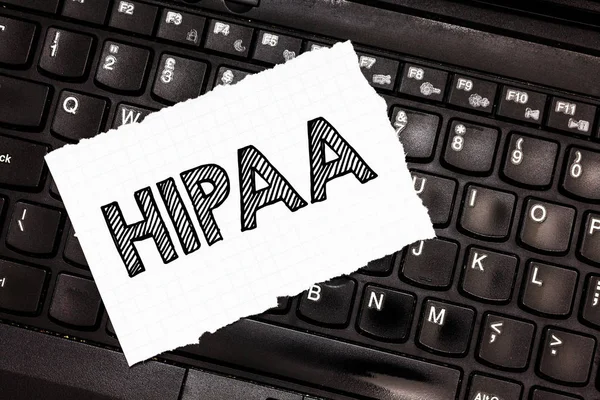 Escribiendo nota que muestra Hipaa. Foto de negocios que muestra acrónimo significa Responsabilidad de Portabilidad de Seguros Médicos — Foto de Stock