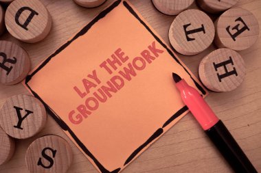 Text sign showing Lay The Groundwork. Conceptual photo Preparing the Basics or Foundation for something clipart