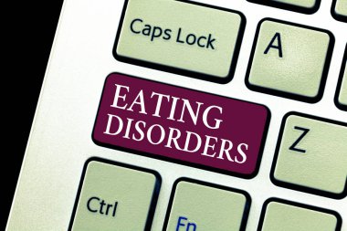 Yemek yeme bozukluklarını gösteren kavramsal el yazısı. İş fotoğraflarında herhangi bir psikolojik anormal yiyecek alışkanlığı var mı?