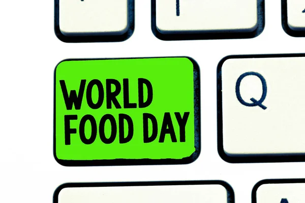 显示世界粮食日的概念手写。商业照片文本致力于解决全球饥饿问题的世界行动日 — 图库照片