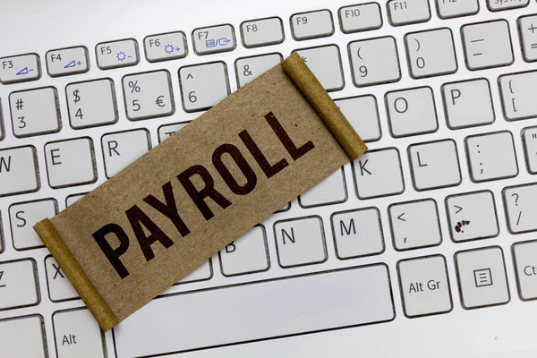 Handgeschreven tekst schrijven Payroll. Begrip betekenis totale hoeveelheid geld bedrijf betaalt aan de werknemers salarisbetaling — Stockfoto