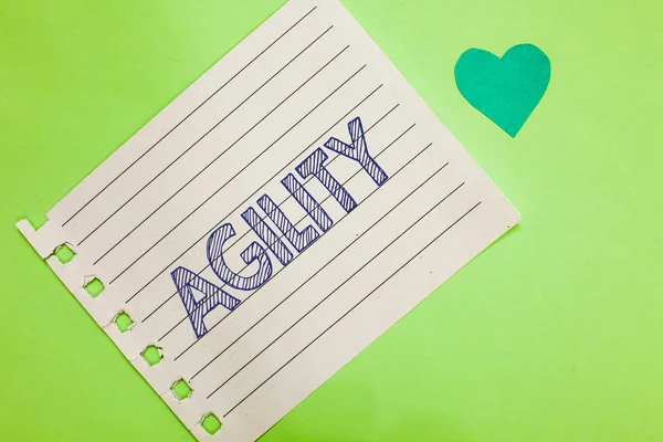 Word writing text Agility. Business concept for Ability to move think understand quickly and easily Fast development Notebook piece paper reminder heart romantic messages green background.