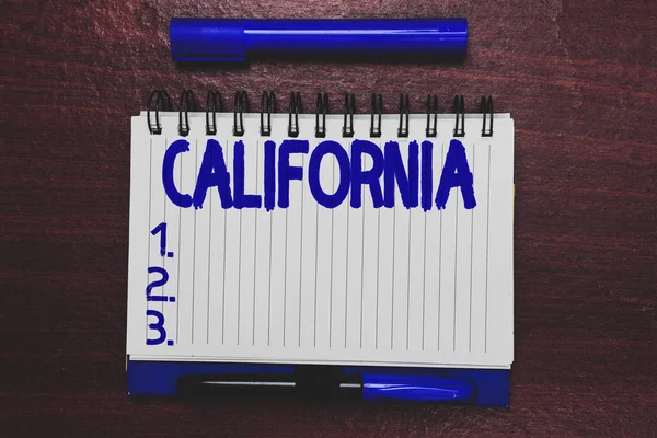 Scrittura concettuale a mano che mostra la California. Business photo text Stato sulla costa occidentale Stati Uniti d'America Spiagge Hollywood Apri il quaderno pennarello che comunica idee legno fondo . — Foto Stock