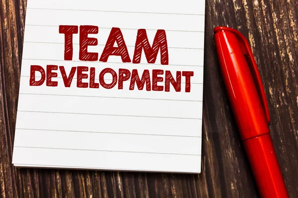 Conceptual hand writing showing Team Development. Business photo showcasing learn why and how small groups change over time with graphs — Stock Photo, Image