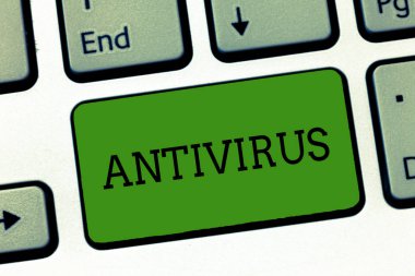 Kavramsal el Antivirus gösterilen yazma. Algılamak ve bilgisayar virüsleri klavye bilgisayar ileti tuş takımı fikir oluşturmak için niyeti yok etmek için tasarlanmış yazılım vitrine iş fotoğraf.