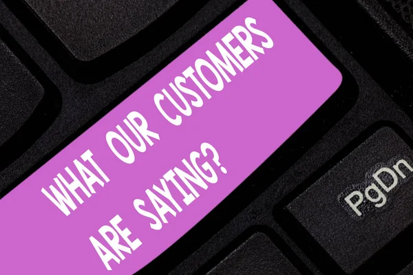 Text sign showing What Our Customers Are Saying. Conceptual photo Satisfaction level reviews client feedback Keyboard key Intention to create computer message pressing keypad idea. — Stock Photo, Image