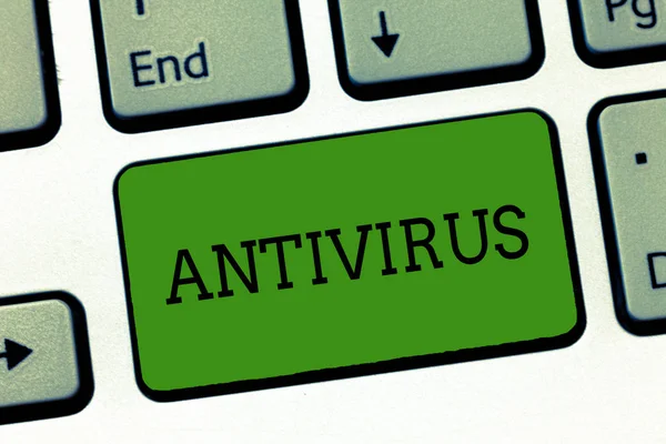 Conceptual hand writing showing Antivirus. Business photo showcasing software designed to detect and destroy computer viruses Keyboard Intention to create computer message keypad idea. Stock Photo