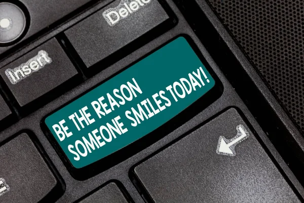 Conceptual hand writing showing Be The Reason Someone Smiles Today. Business photo text Make somebody happy Give some joy Keyboard key Intention to create computer message idea. — Stock Photo, Image