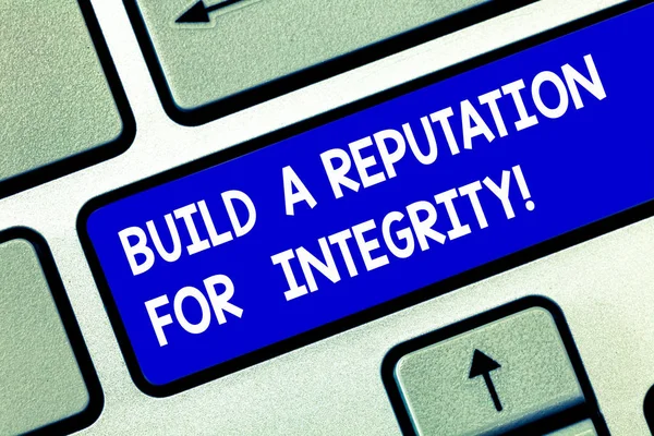 Conceptual hand writing showing Build A Reputation For Integrity. Business photo showcasing Obtain good feedback based on ethics Keyboard key Intention to create computer message idea.