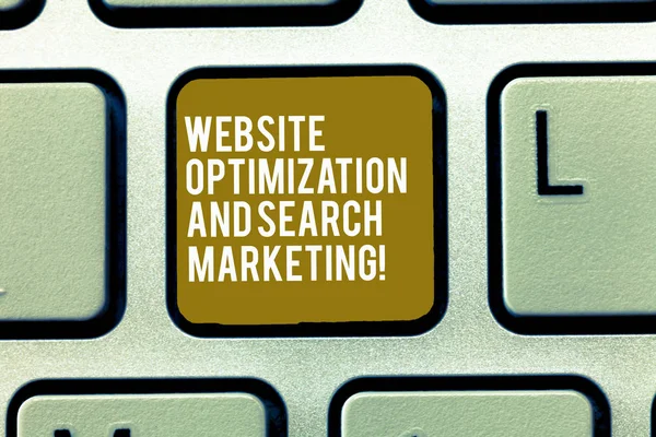 Text sign showing Website Optimization And Search Marketing. Conceptual photo Search engine optimization Keyboard key Intention to create computer message, pressing keypad idea.