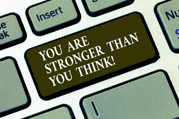 Handwriting text You Are Stronger Than You Think. Concept meaning Adaptability Strength to overcome obstacles Keyboard key Intention to create computer message pressing keypad idea.