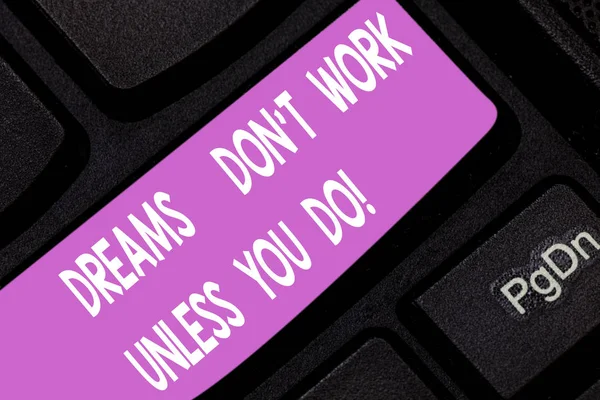 Text sign showing Dreams Don T Work Unless You Do. Conceptual photo Take action to accomplish your goals Keyboard key Intention to create computer message pressing keypad idea.