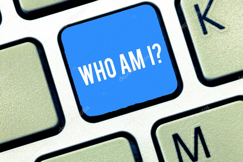 Handwriting text writing Who Am I question. Concept meaning when being asked about your name status and nationality Keyboard key Intention to create computer message, pressing keypad idea.