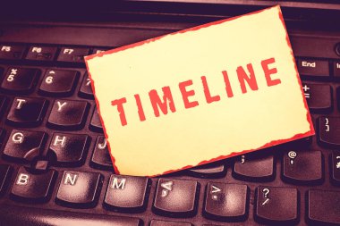Zaman çizelgesi gösterilen Not yazma. Dönem zaman üzerinde boş sınırlanmıştır Not defteri hatırlatan eklenen arasındaki tuşları, Laptop olayları işaretlenir grafik gösterimini vitrine iş fotoğraf.