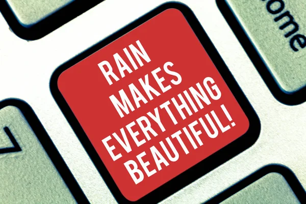 Handwriting text writing Rain Makes Everything Beautiful. Concept meaning Raining convert places in pretty landscapes Keyboard key Intention to create computer message pressing keypad idea.