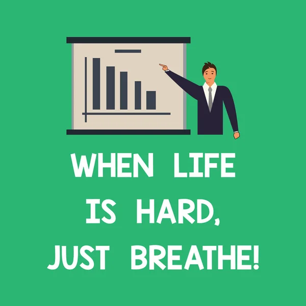 Conceptual hand writing showing When Life Is Hard Just Breathe. Business photo text Take a break to overcome difficulties Man in Business Suit Pointing a Board Bar Chart Copy Space.