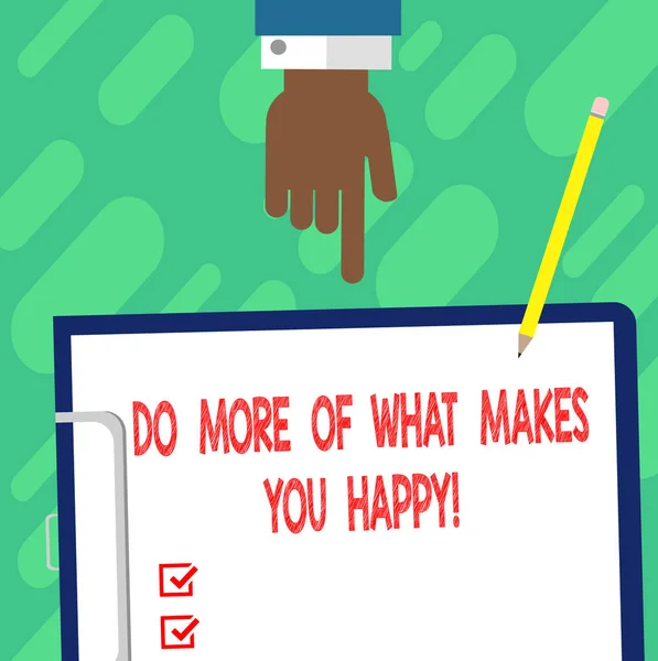 Escribir texto a mano Hacer más de lo que te hace feliz. Concepto significado Sigue haciendo las cosas actividades que te gustan disfruta el análisis de Hu Mano señalando hacia abajo al portapapeles con papel de enlace en blanco y lápiz . —  Fotos de Stock