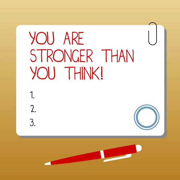 Writing note showing You Are Stronger Than You Think. Business photo showcasing Adaptability Strength to overcome obstacles Square Color Board with Magnet Click Ballpoint Pen and Clip.