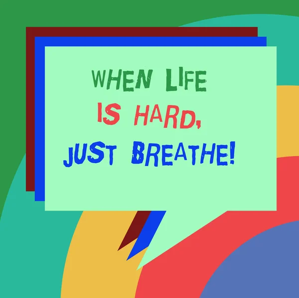 Conceptual hand writing showing When Life Is Hard Just Breathe. Business photo text Take a break to overcome difficulties Stack of Speech Bubble Different Color Piled Text Balloon.