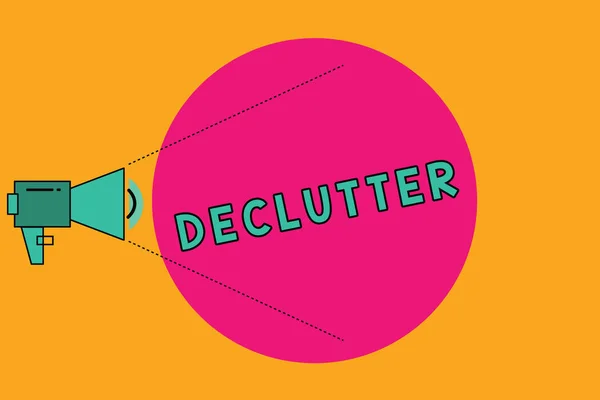 Κείμενο πινακίδα που δείχνει Declutter. Εννοιολογική φωτογραφία καταργήσετε περιττά στοιχεία από ακατάστατα ή υπερπλήρεις τόπο μεγάφωνο με πίσσα δύναμη επίπεδο έντασης ήχου εικονίδιο και κενό κύκλο. — Φωτογραφία Αρχείου