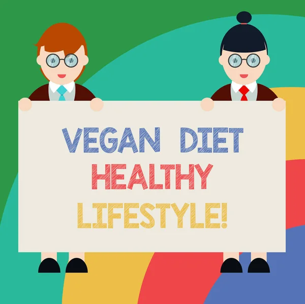 Conceptual hand writing showing Vegan Diet Healthy Lifestyle. Business photo text Healthy lifestyle eating vegetables and fruits Male and Female in Uniform Holding Placard Banner Text Space.