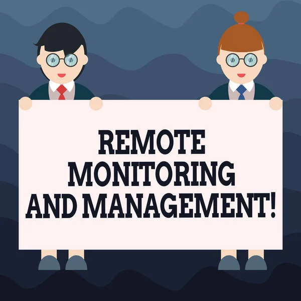 Writing note showing Remote Monitoring And Management. Business photo showcasing Long distance monitor data analysisager Male and Female in Uniform Holding Placard Banner Text Space. — Stock Photo, Image