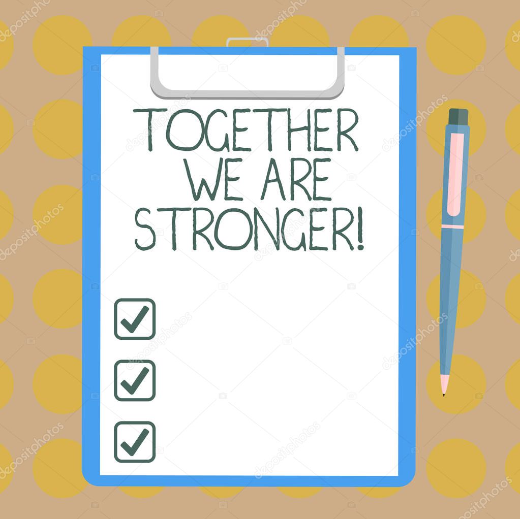 Word writing text Together We Are Stronger. Business concept for Working on a team gives best business results Blank Sheet of Bond Paper on Clipboard with Click Ballpoint Pen Text Space.
