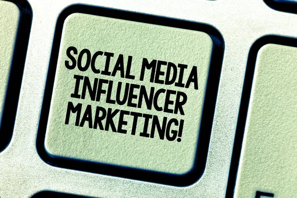Conceptual hand writing showing Social Media Influencer Marketing. Business photo showcasing Blogger online modern advertising Keyboard key Intention create computer message keypad idea.