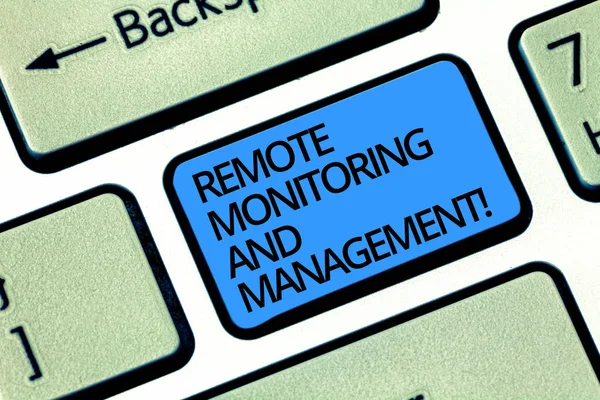 Writing note showing Remote Monitoring And Management. Business photo showcasing Long distance monitor data analysisager Keyboard key Intention to create computer message pressing keypad idea. — Stock Photo, Image