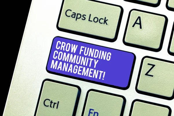 Conceptual hand writing showing Crow Funding Community Management. Business photo showcasing Venture fund project investments Keyboard Intention to create computer message keypad idea.