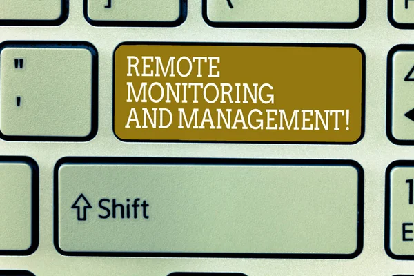 Word writing text Remote Monitoring And Management. Business concept for Long distance monitor data analysisager Keyboard key Intention to create computer message, pressing keypad idea. — Stock Photo, Image