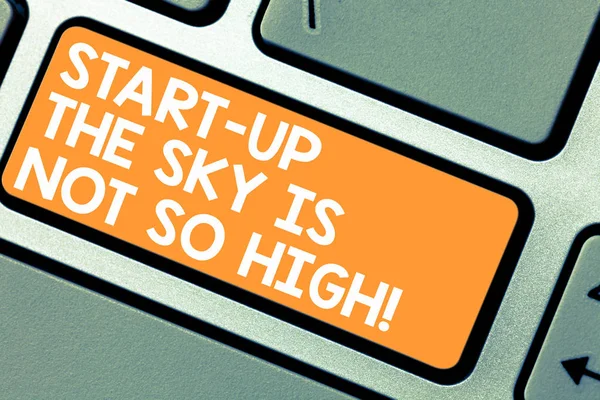 Word writing text Start Up The Sky Is Not So High. Business concept for Motivation to grow as much as you want Keyboard key Intention to create computer message pressing keypad idea.