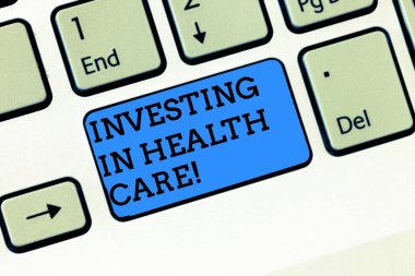 Metin yazma, Word içinde yatırım sağlık. İş kavramı refah tıbbi sigorta klavye tuşuna basarak tuş takımı fikir bilgisayar iletisi oluşturmak için niyet yatırımları yapmak için.