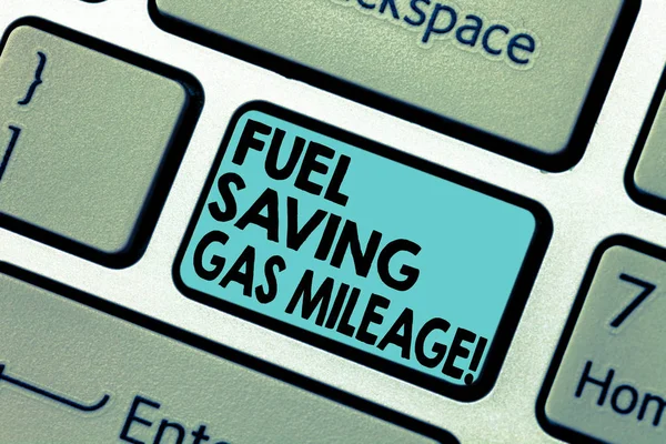 Text sign showing Fuel Saving Gas Mileage. Conceptual photo Expending less money in vehicle expenses gas savings Keyboard key Intention to create computer message pressing keypad idea.
