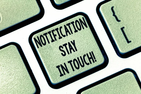 Text sign showing Notification Stay In Touch. Conceptual photo Do not forget to be connected Social networks Keyboard key Intention to create computer message pressing keypad idea.